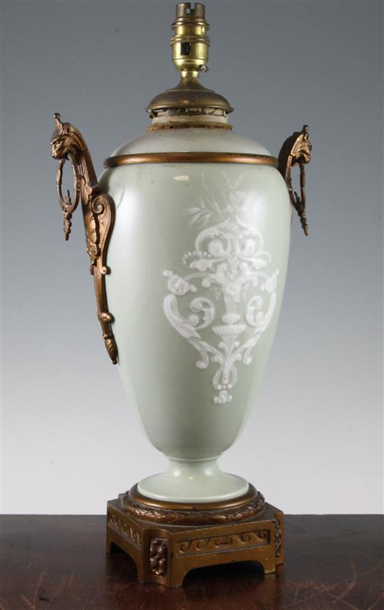 French paté-sur-paté celadon ground and gilt metal mounted lamp base, late 19th century, total height 46cm(-)